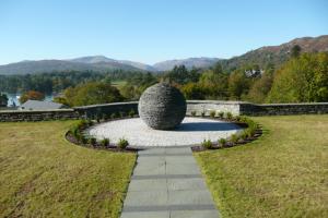 Stone globe garden feature implemented by Chris Rabone Landscapes Stone globe garden feature implemented by Chris Rabone Landscapes